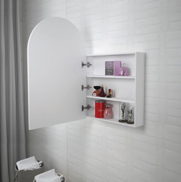 Otti Arched Matte White Shaving Cabinet with an open-door design, revealing spacious internal shelves for organized storage of toiletries and decor items, set against a textured white wall for a clean and modern look.