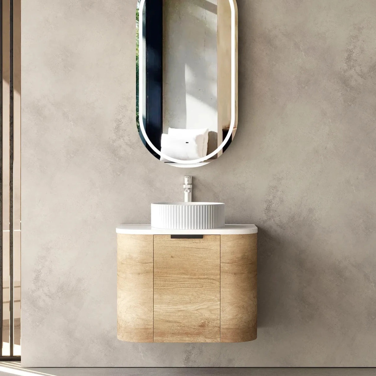 Bathroom with installed mirror and Bondi Wall Hung Vanity Curve 600mm – Natural Oak