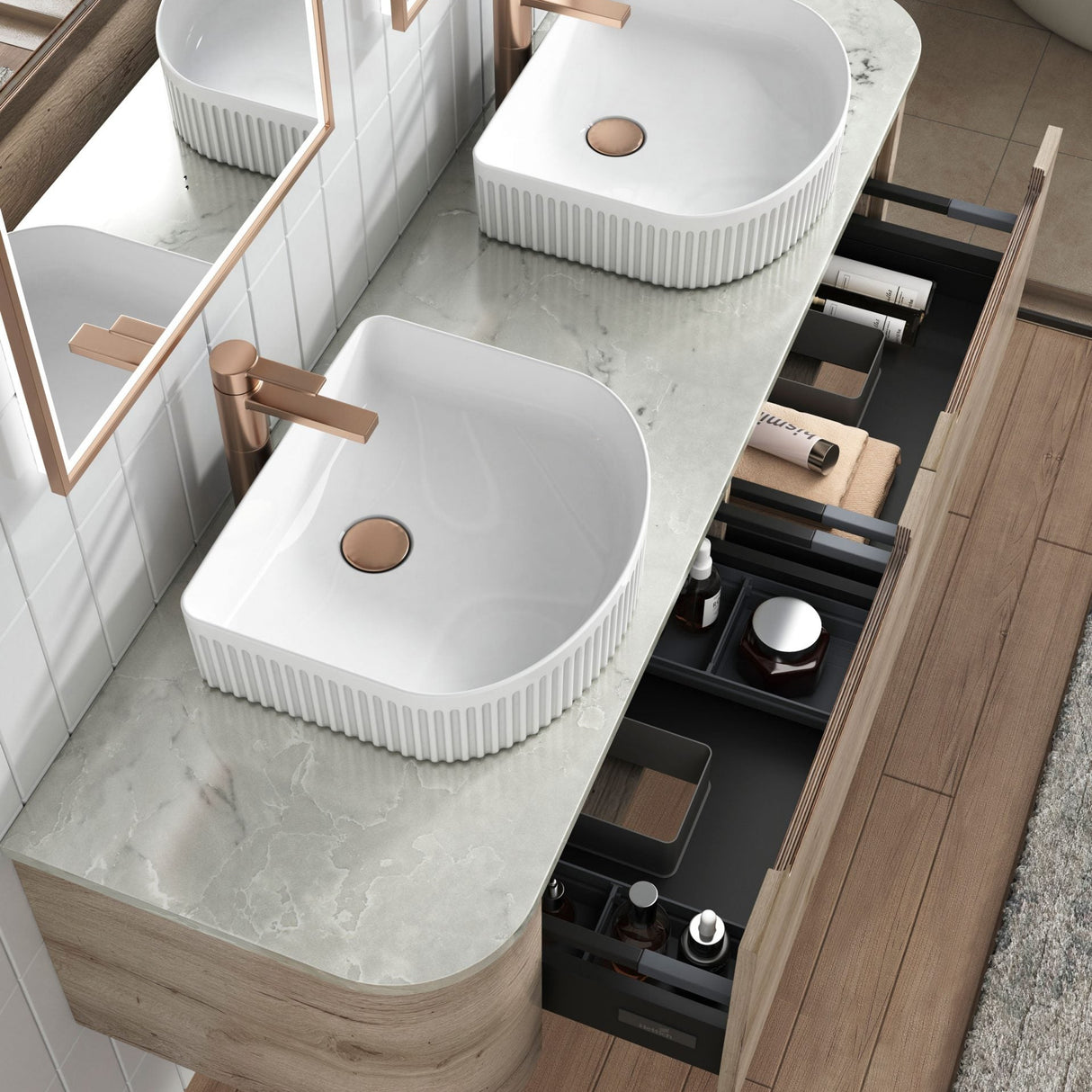 Bathroom vanity with white sinks, wooden cabinets, and mirrors.