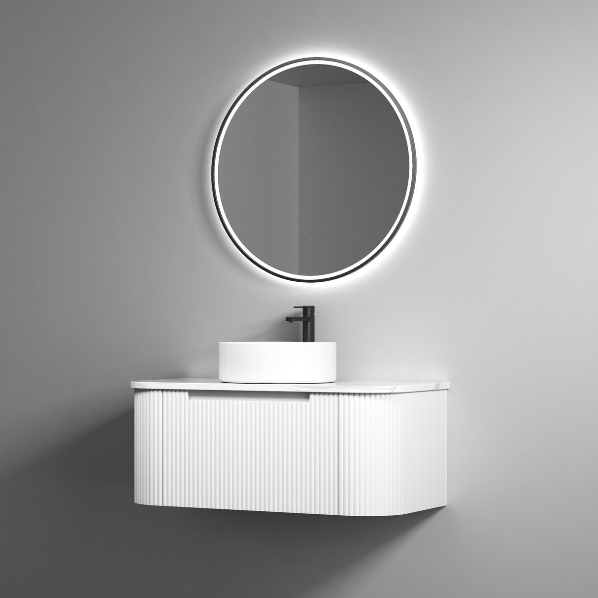 Bathroom vanity with round illuminated mirror on a gray wall
