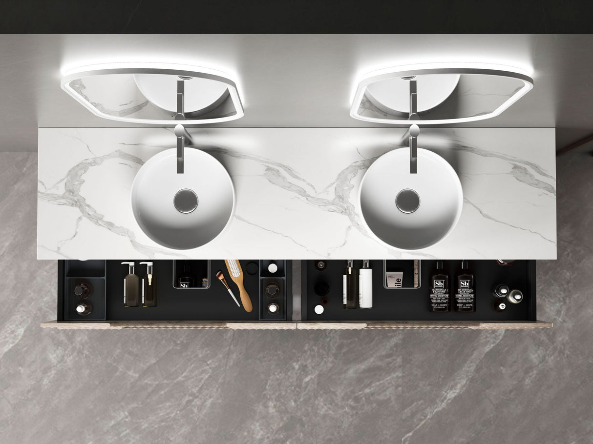 Modern kitchen island with built-in cooktop and storage compartments on a marble countertop.
