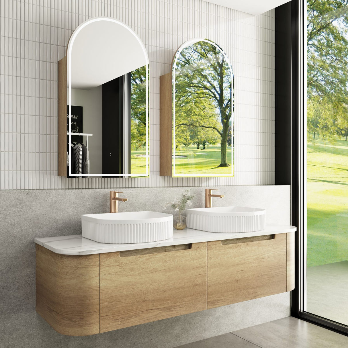Modern bathroom with wooden vanity, white sinks, and large windows.
