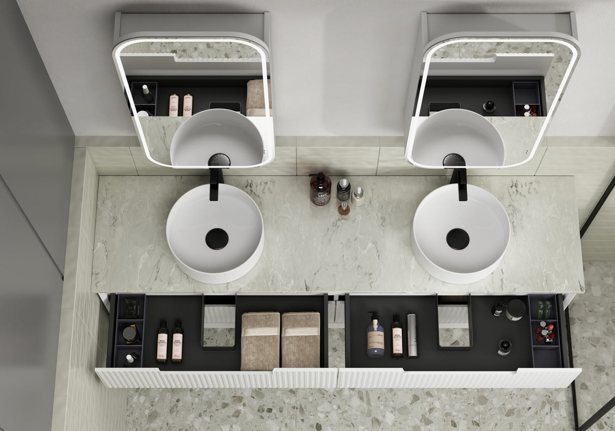 Modern bathroom vanity with two sinks, mirrors, and various toiletries.