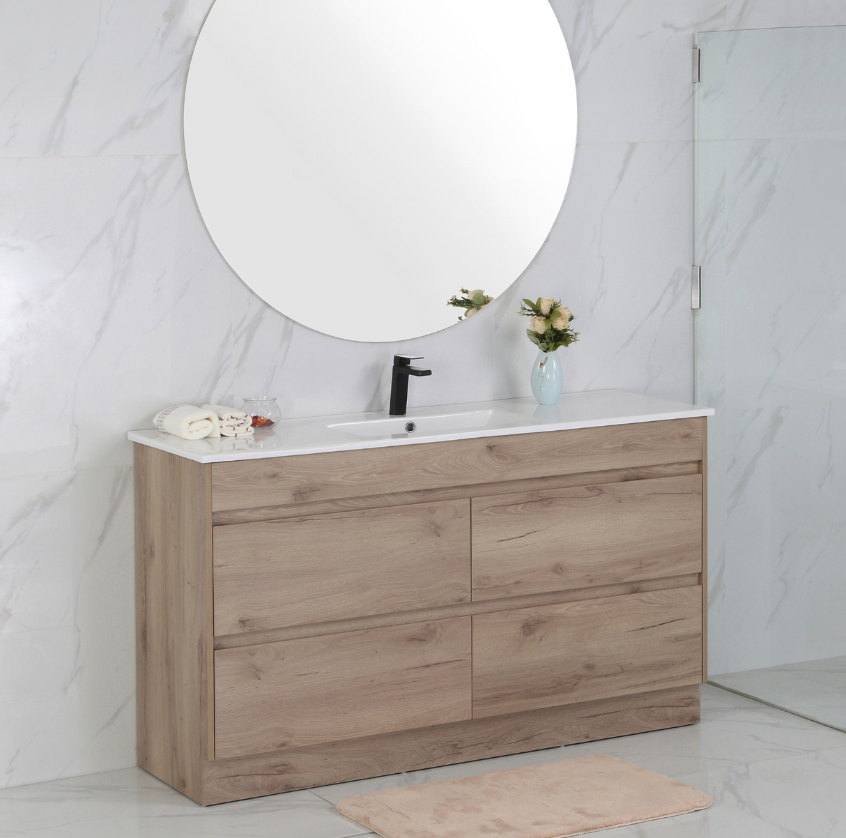 Bathroom vanity with wooden finish and round mirror on marble wall