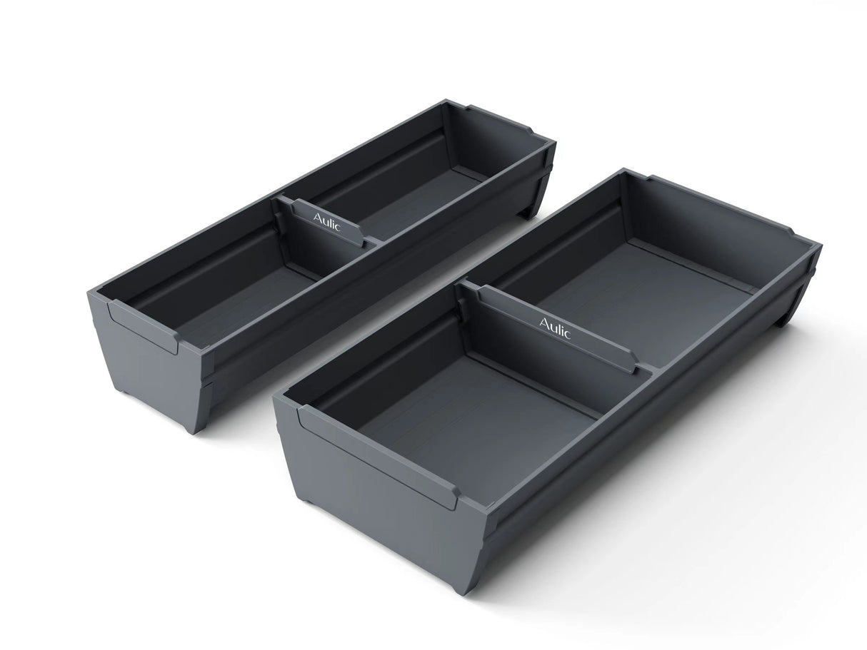 Two gray storage trays on a white background