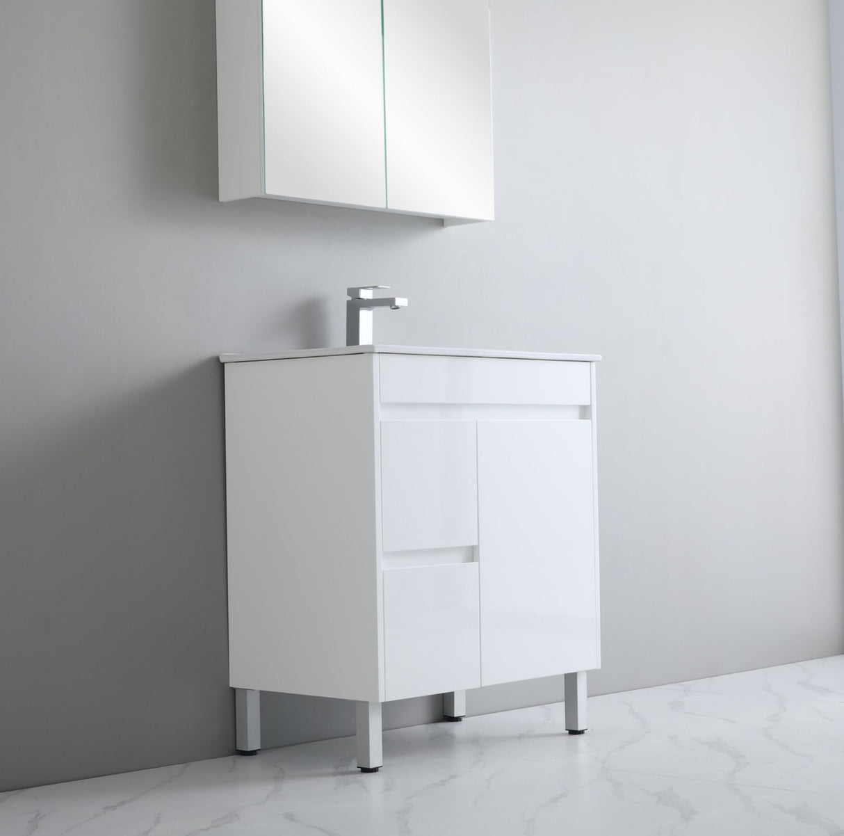 White bathroom cabinet with a sink against a gray wall
