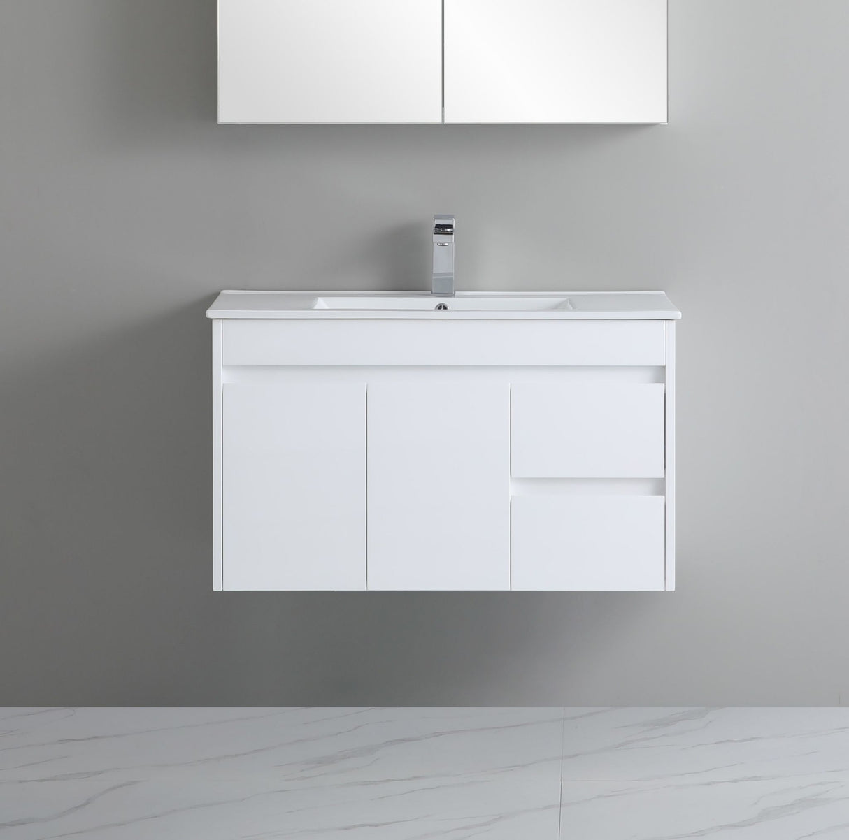 White bathroom vanity with sink and cabinet on a gray wall background