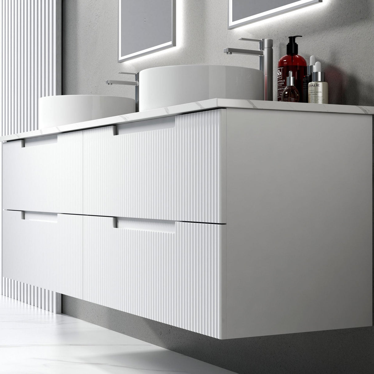 Modern bathroom vanity with white cabinets and a gray wall.