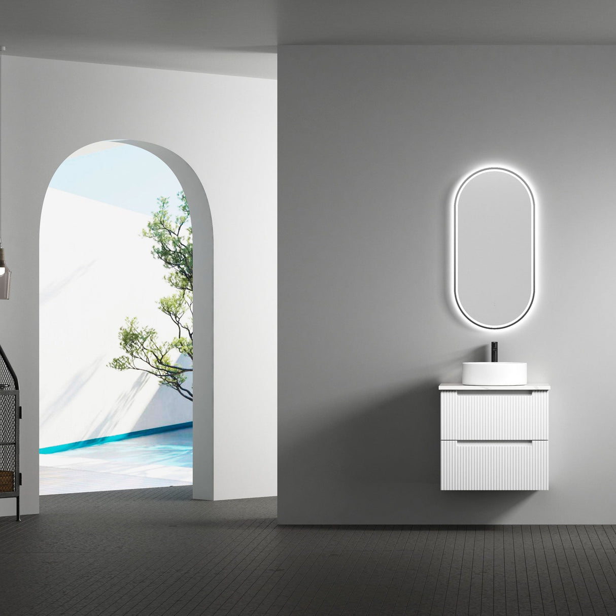 Modern bathroom with a vanity unit and illuminated mirror.