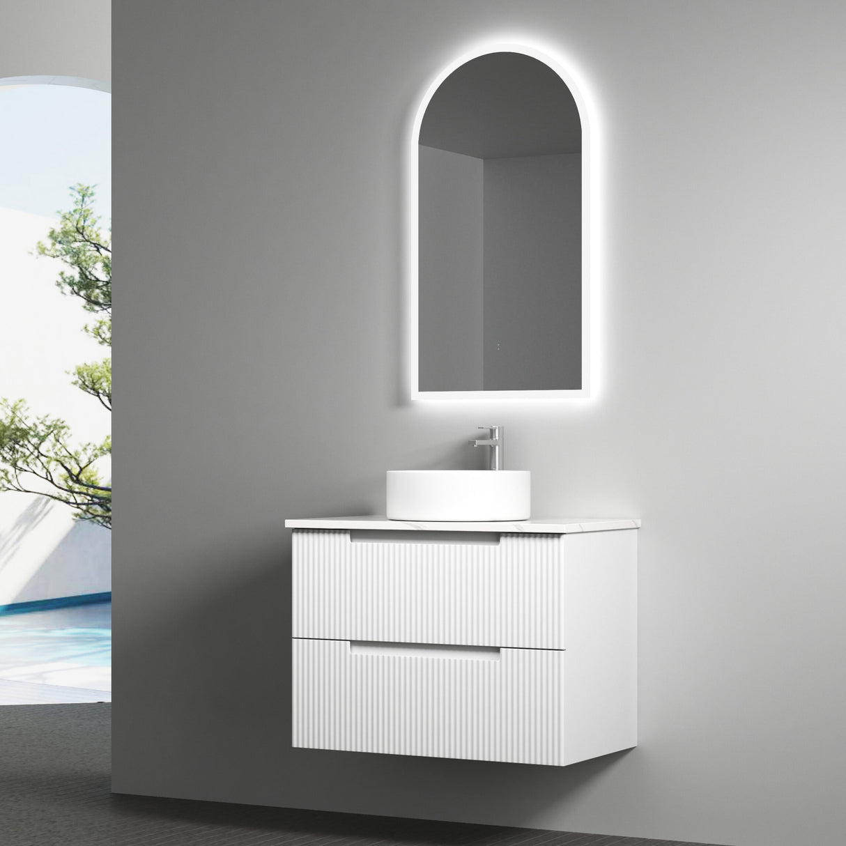 Bathroom vanity with illuminated mirror in a modern setting