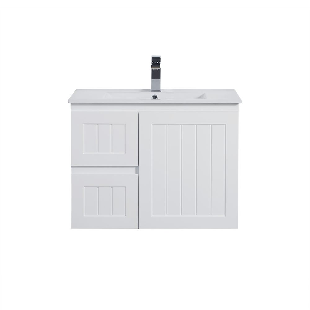White bathroom vanity with sink and faucet on a white background