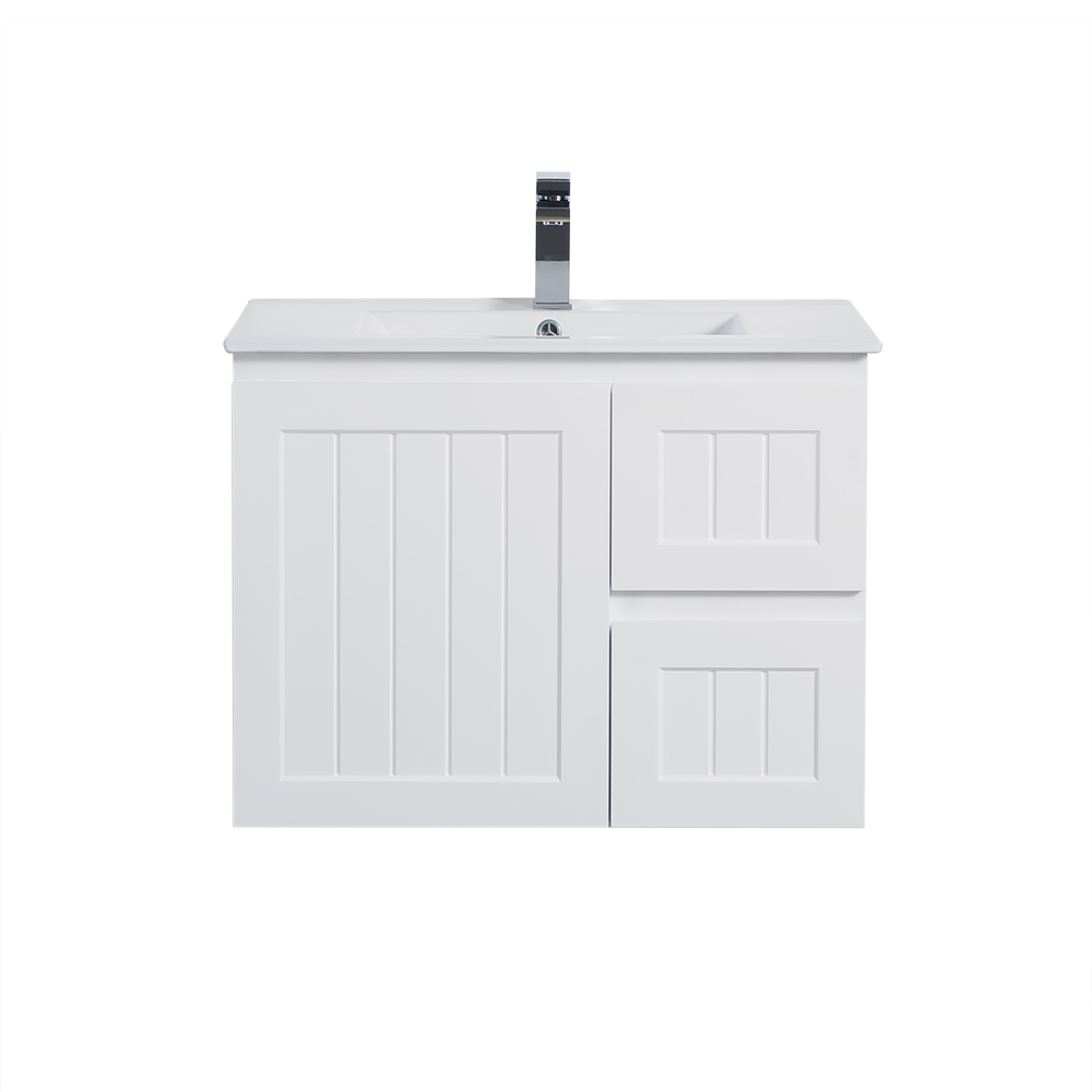 White bathroom vanity with sink and faucet on a white background
