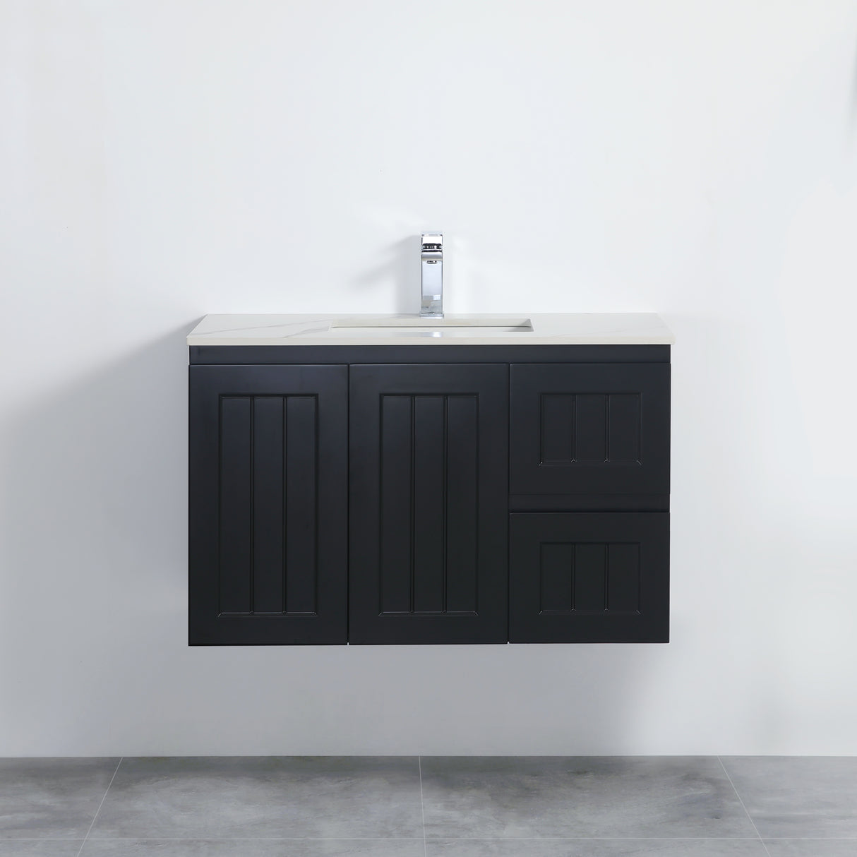 Black bathroom vanity with white countertop against a white wall