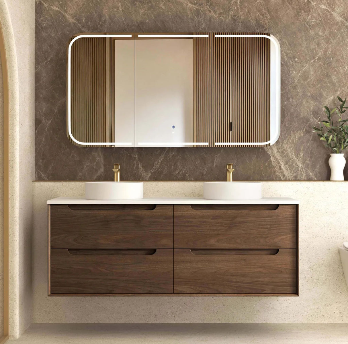 Bathroom vanity with wooden cabinets, white countertop, and mirror on a marble wall.