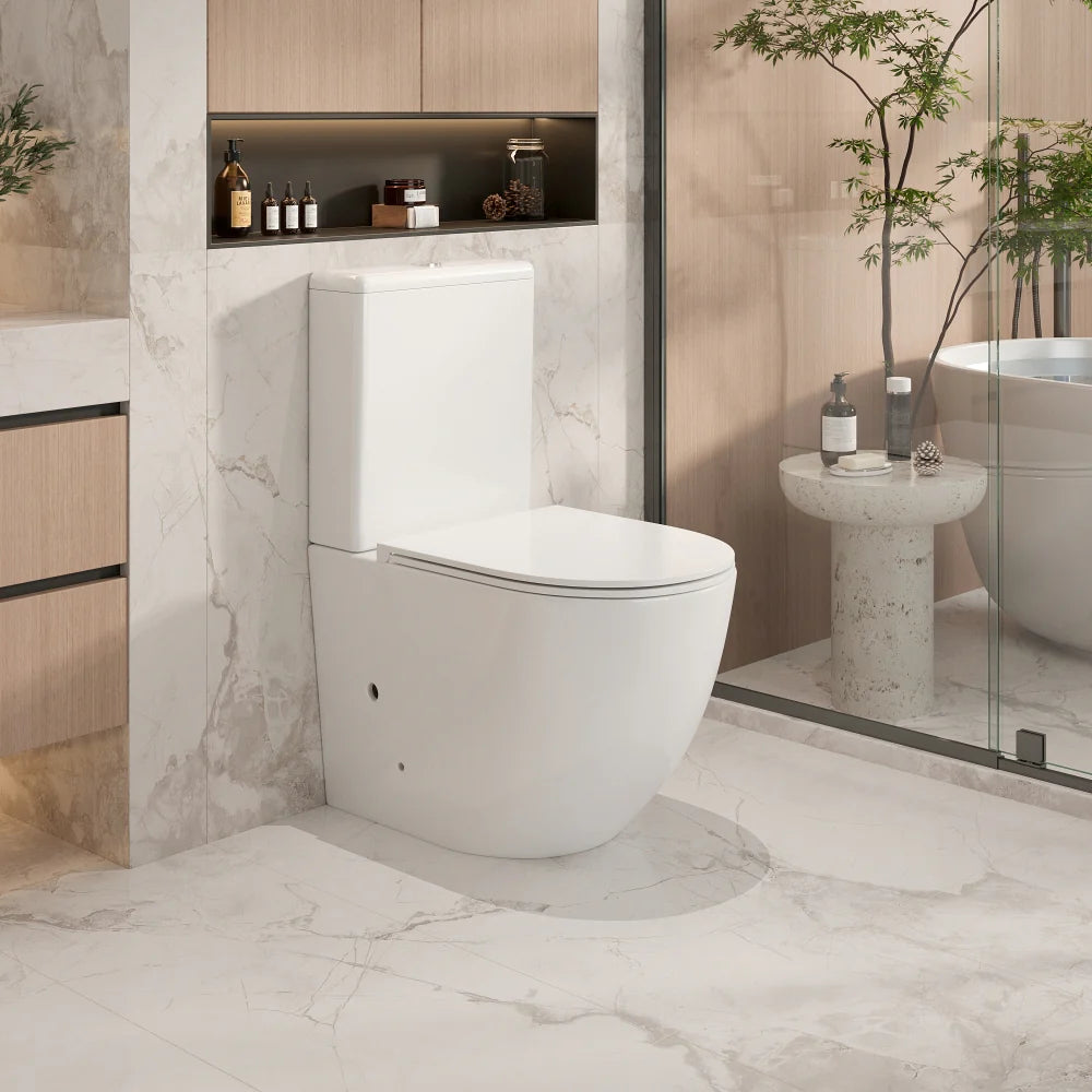 Modern bathroom with a white toilet and marble floor
