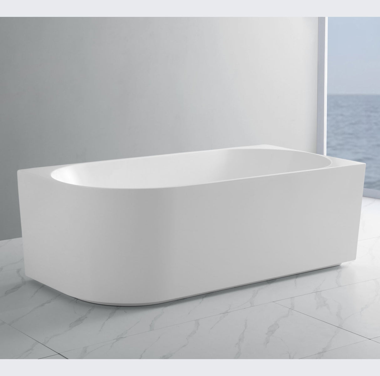 White freestanding bathtub in a modern bathroom setting