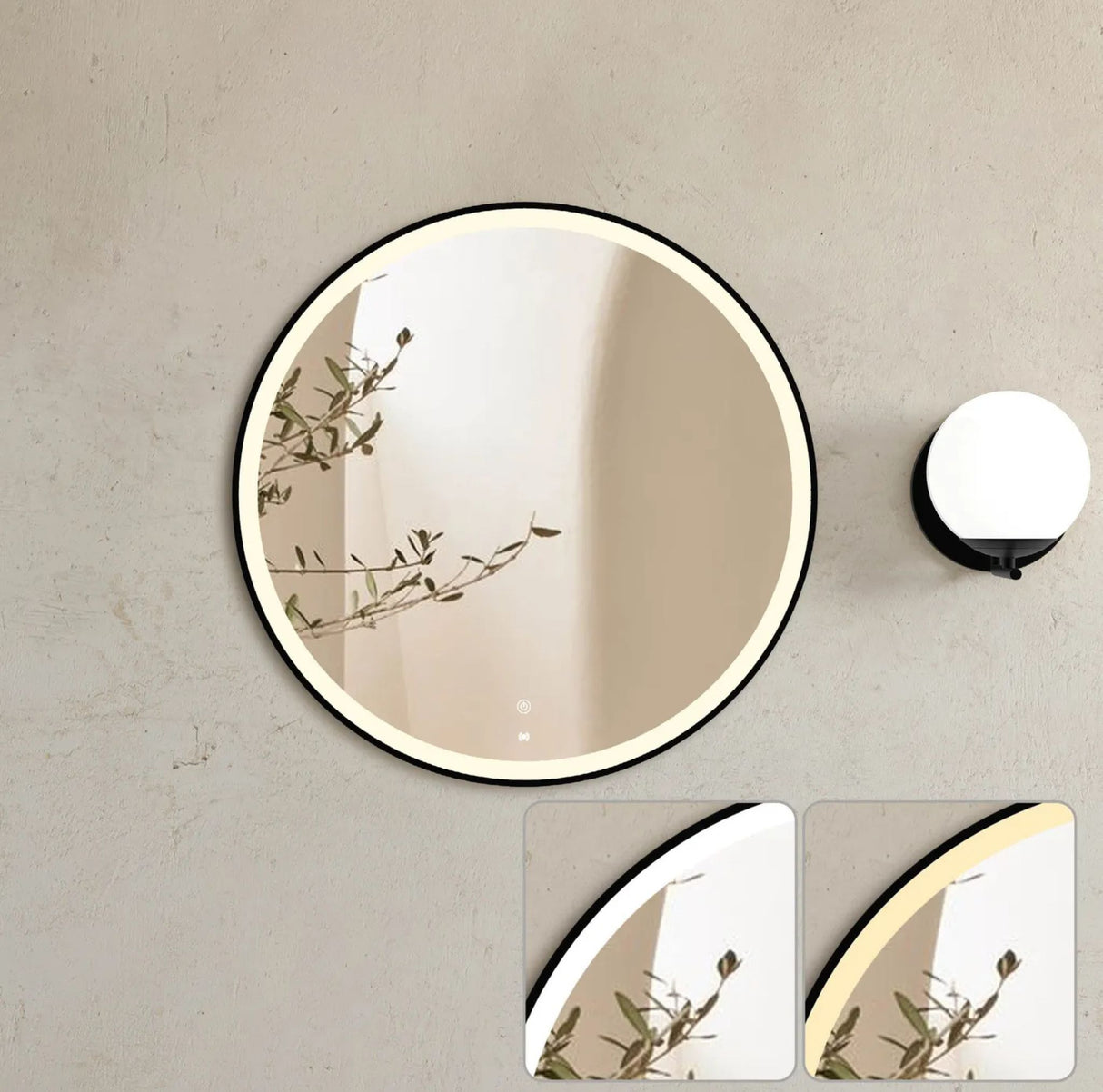 Round wall mirror with decorative branches on a neutral wall