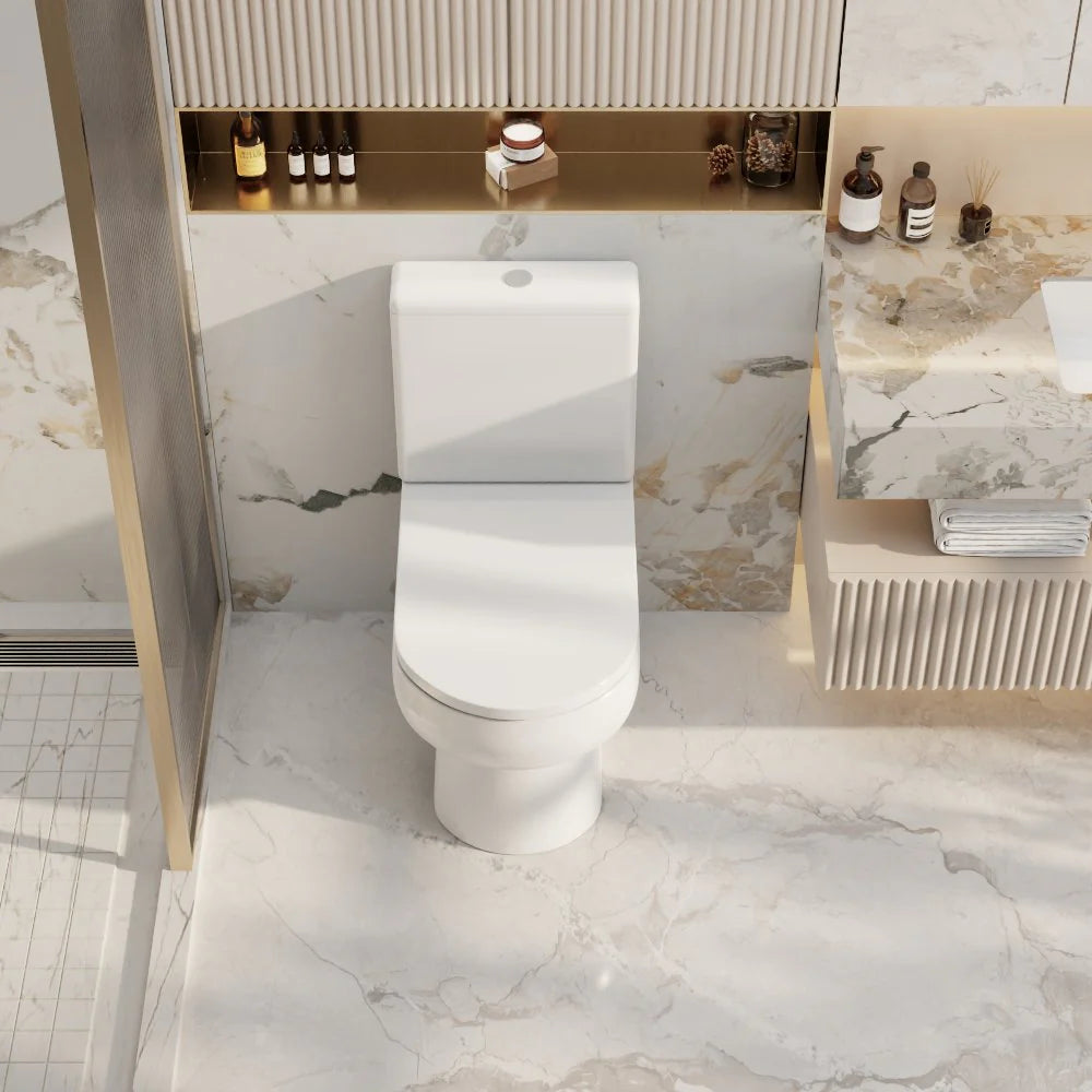 Modern bathroom with a white toilet and marble floor