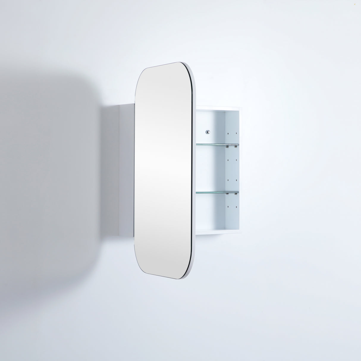side view of open rectangular shaped white shaving cabinet in grey wall
