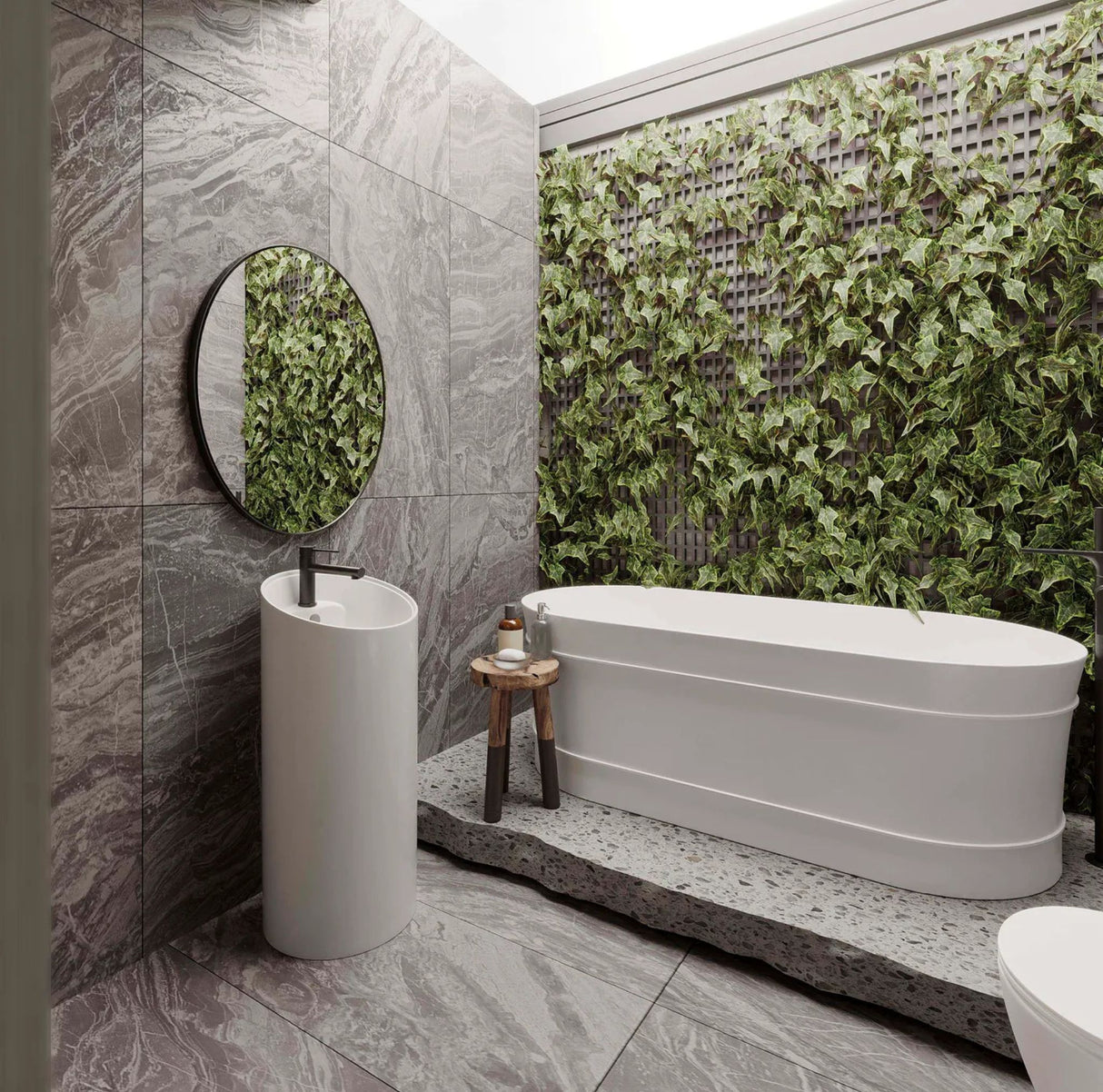 Modern bathroom with a freestanding bathtub, sink, and green wall feature.