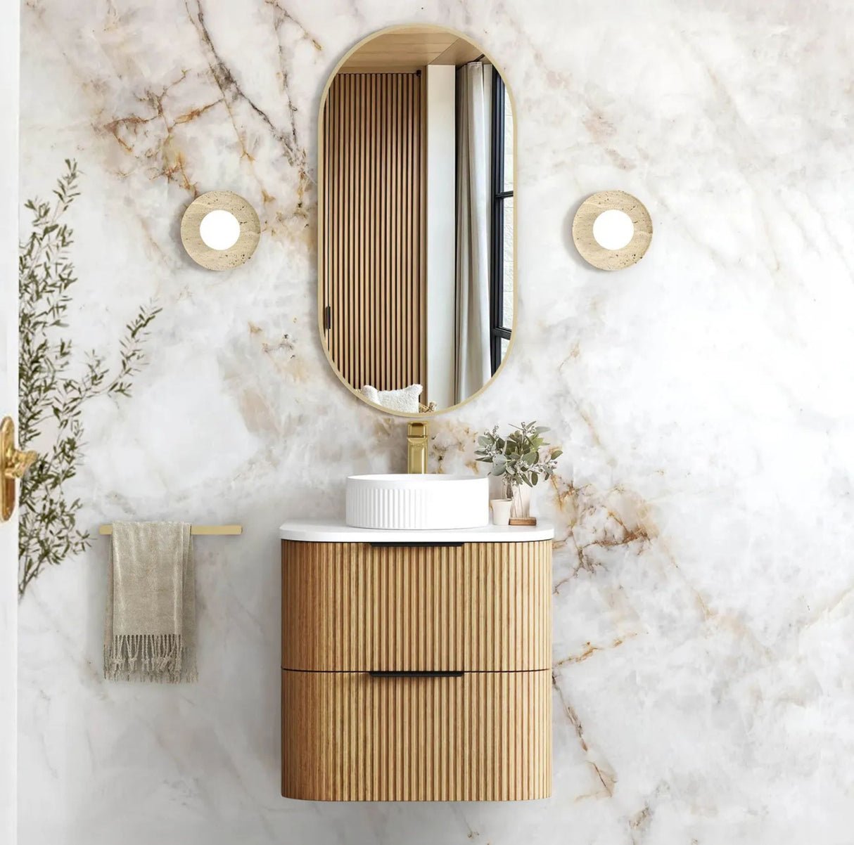Bathroom vanity with rattan cabinet and mirror on a marble wall