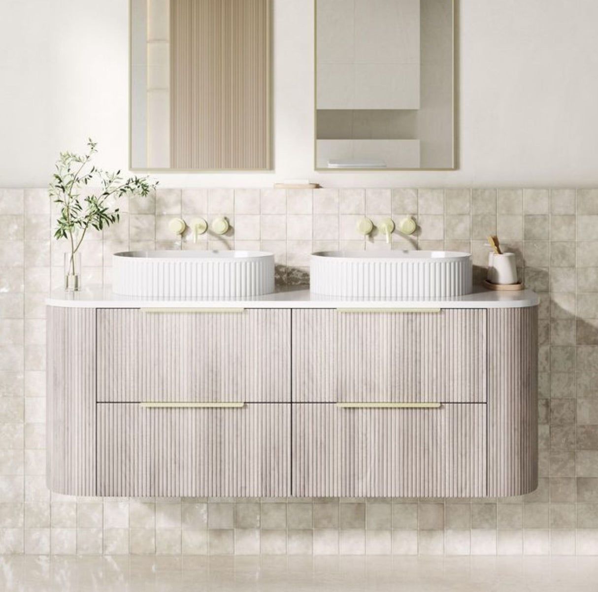 Bathroom vanity with two sinks and a mirror above, featuring a neutral color scheme.