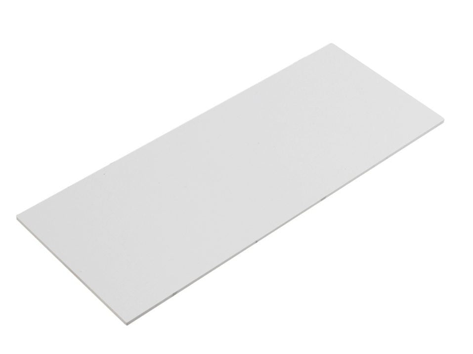 Rectangular white tile on a white background
