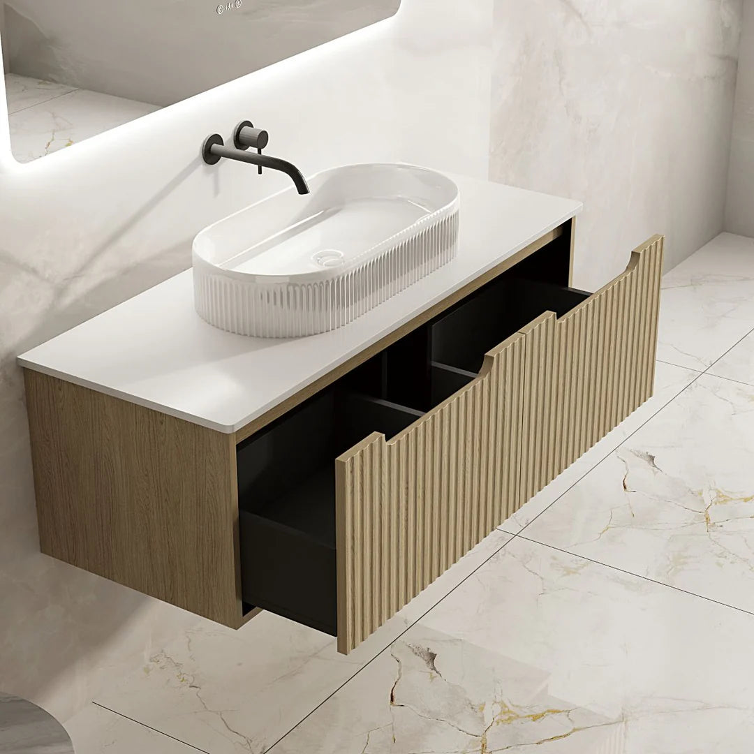 Bathroom vanity with white sink and wooden cabinet
