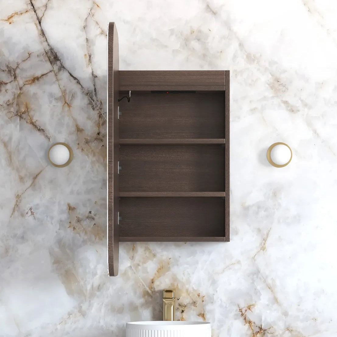Bathroom setup with wooden cabinet, sink, and marble wall.