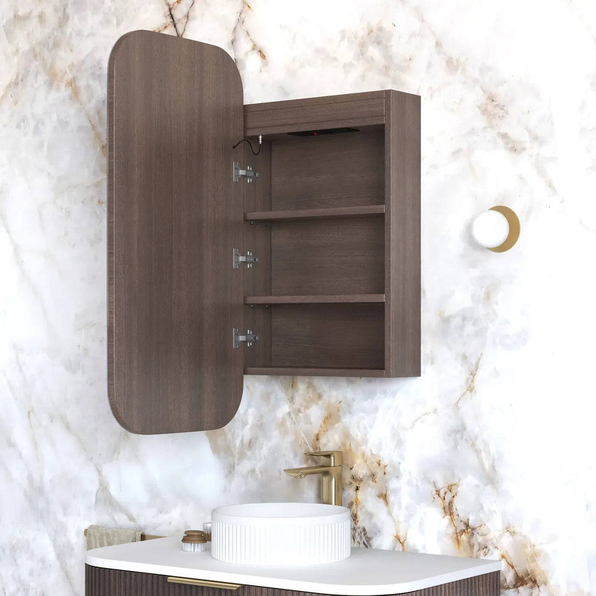 Wooden wall-mounted cabinet with open door against a marble wall.