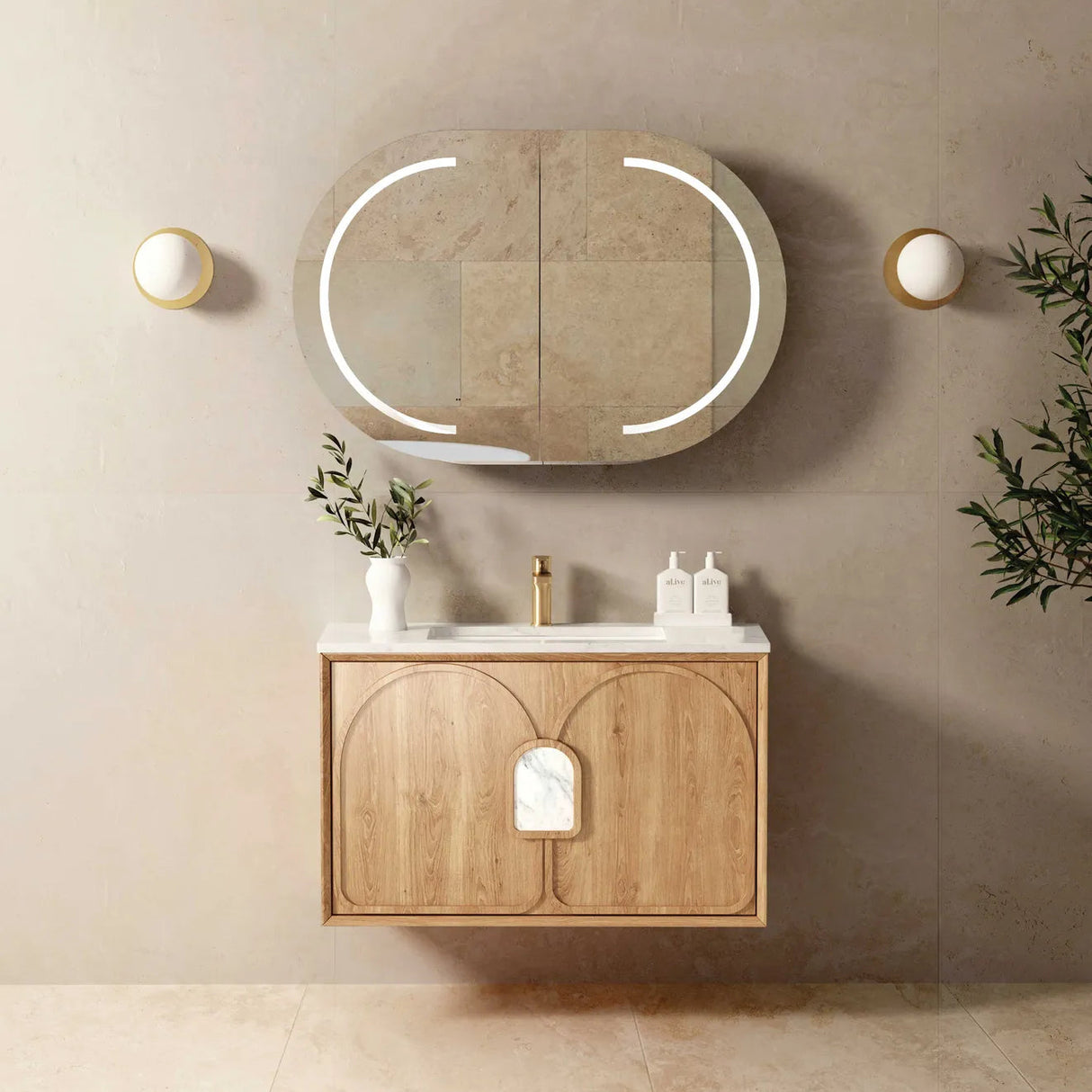 Bathroom vanity with wooden cabinet, mirror, and decorative items against a beige wall.