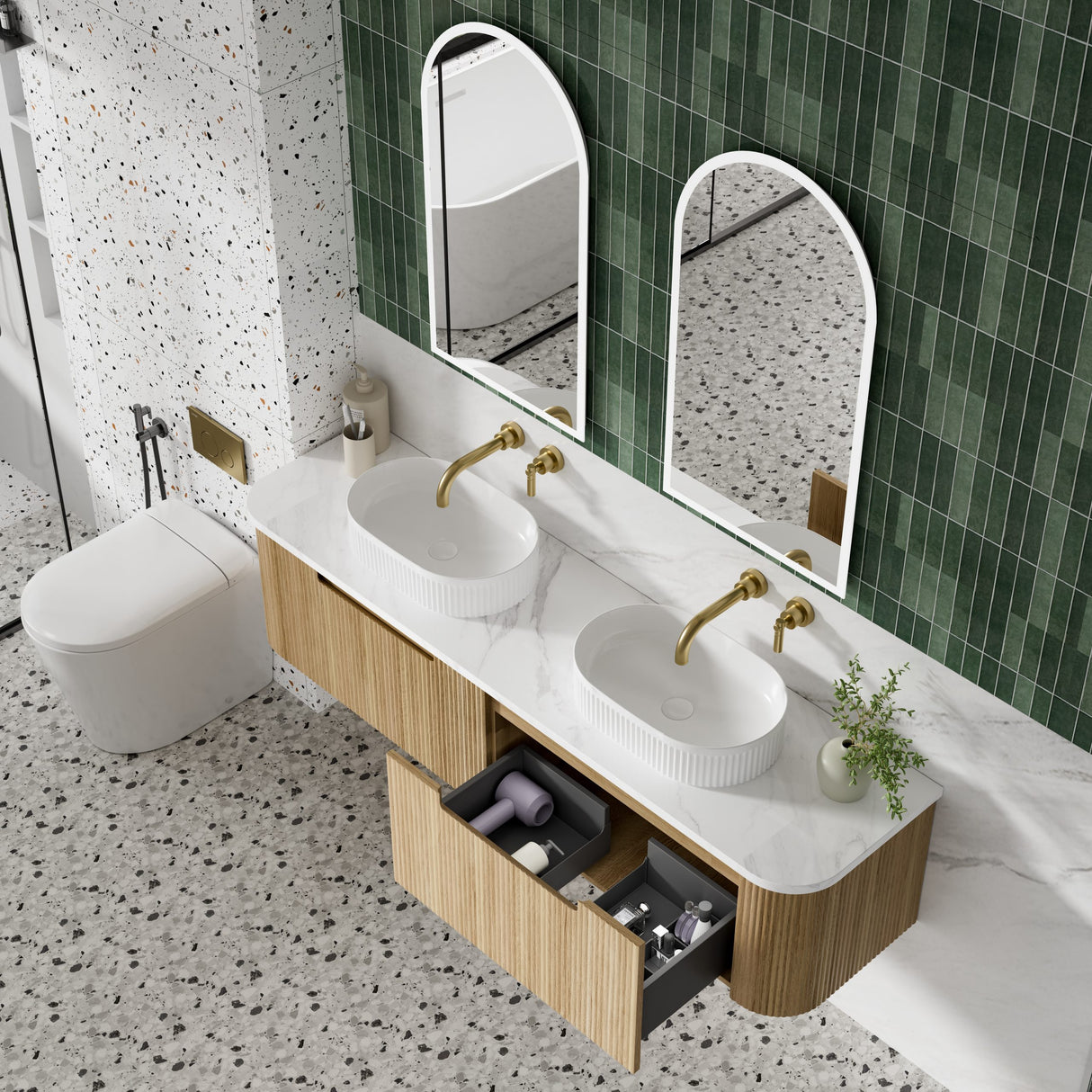 Bathroom with double sink vanity, mirrors, and a toilet.