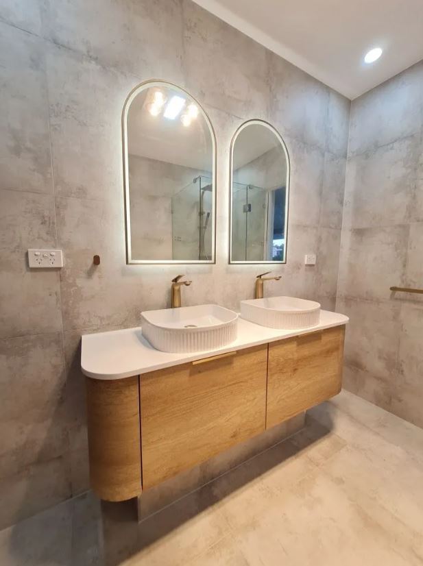 Bathroom with two mirrors and Bondi Wall Hung Vanity Curve 1500mm – Natural Oak