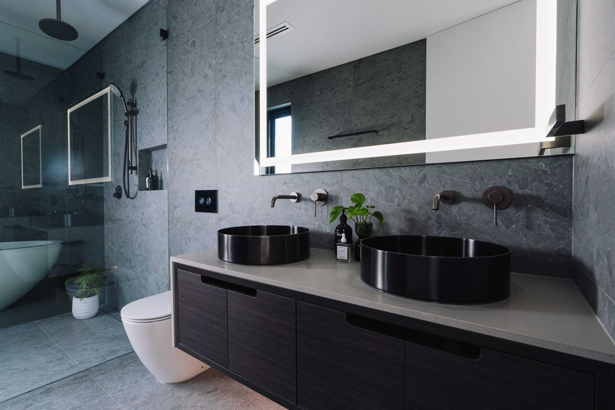 Bathroom with installed wall hung vanities