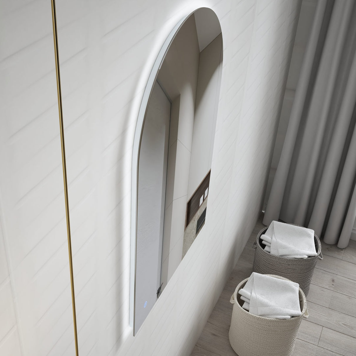 LED Bathroom Mirror Light - Archie, featuring a sleek arched design with soft integrated LED lighting, mounted on a white textured wall, accompanied by modern decor elements including woven baskets filled with towels.
