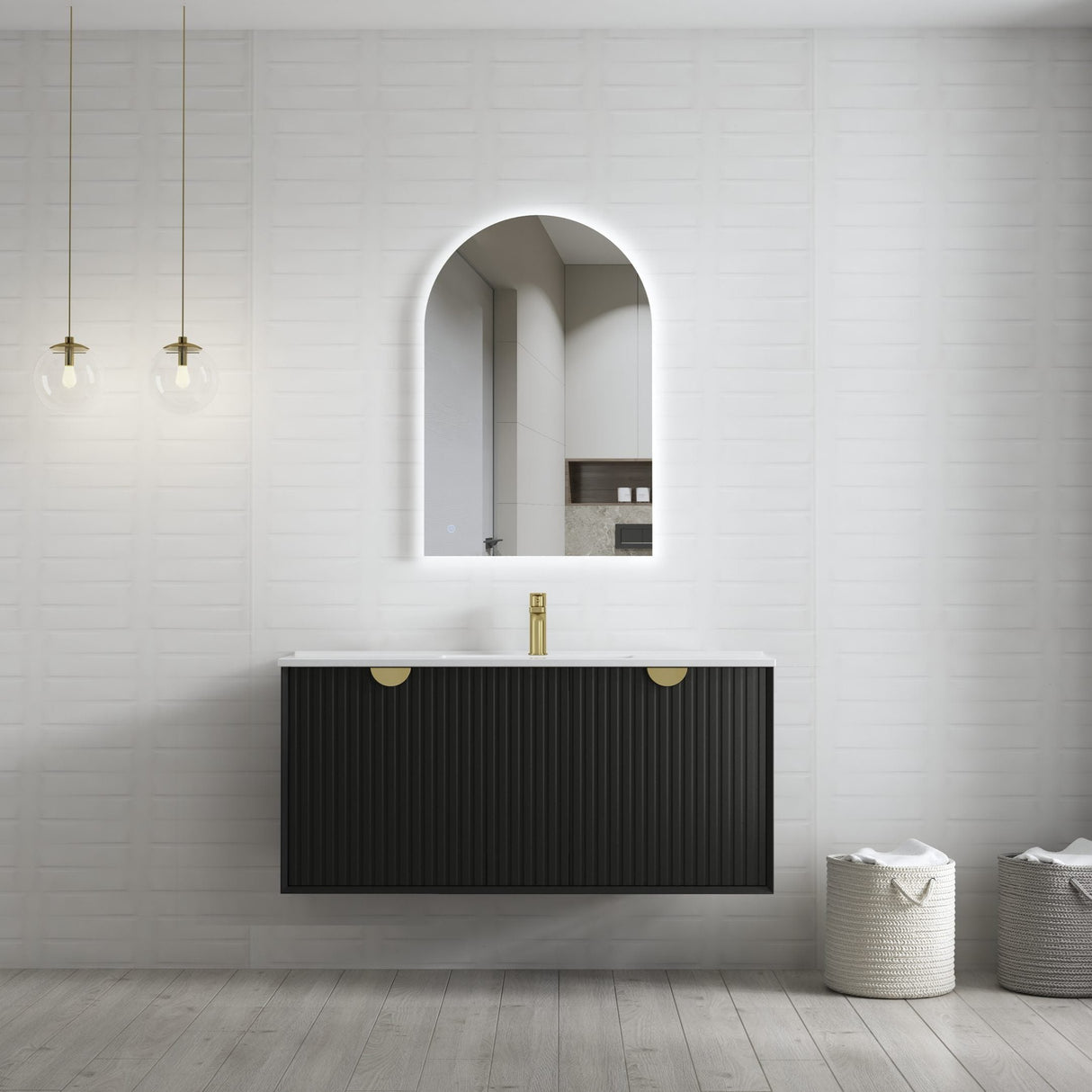 LED Bathroom Mirror Light - Archie, showcasing a modern arched design with integrated soft LED illumination, paired with a sleek black vanity featuring gold accents, all set against a clean white textured wall for a contemporary bathroom aesthetic.