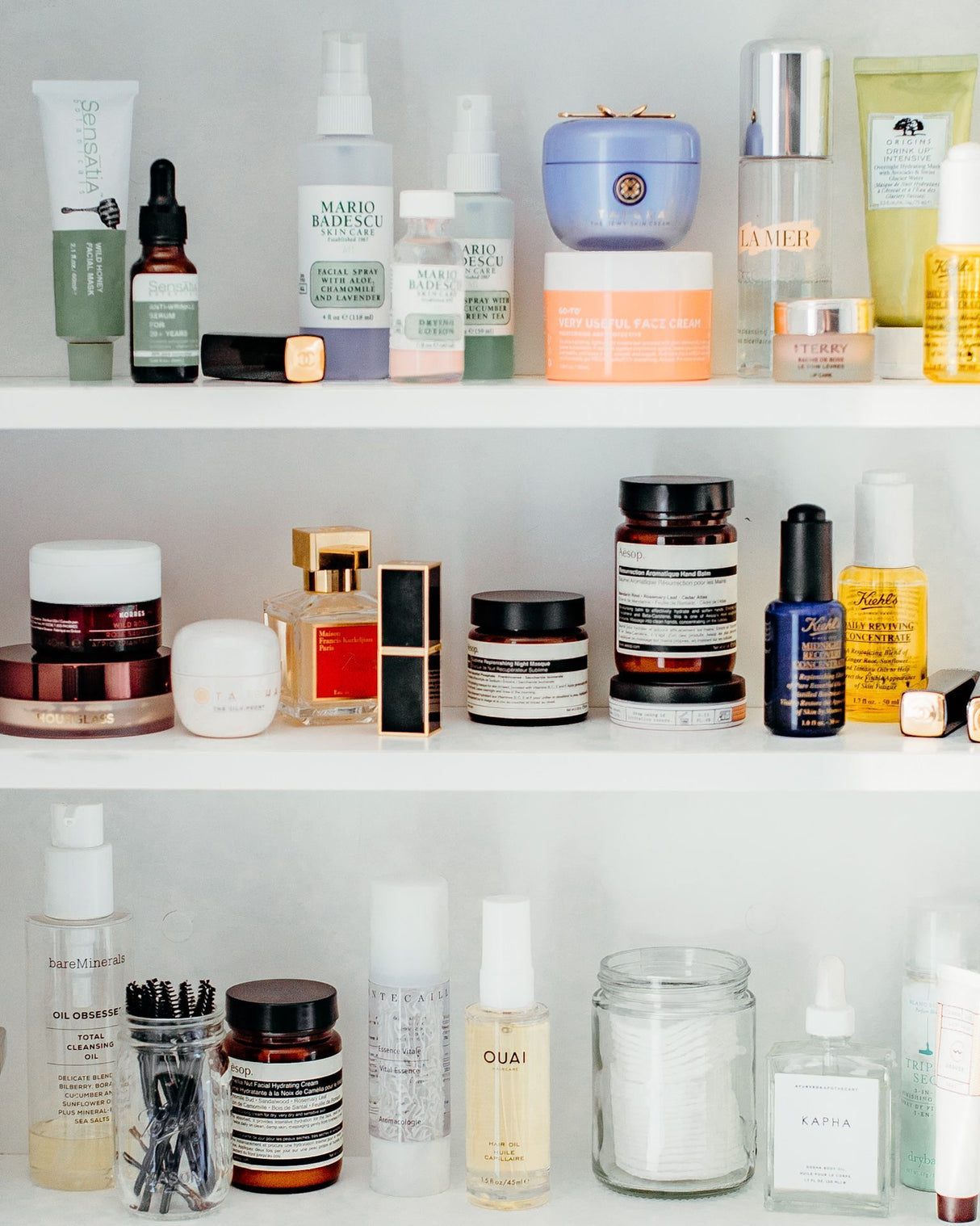 Beauty and essentials items of woman inside the cabinet