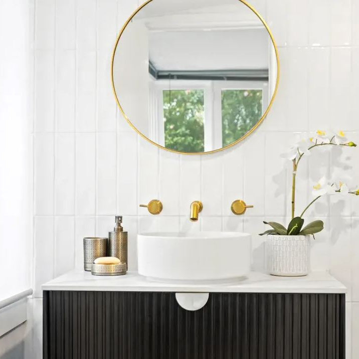 bathroom with gold frame circular mirror and wall hung Marlo Vanity 900mm - Matte Black