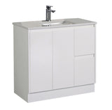White bathroom vanity with sink and faucet on a white background