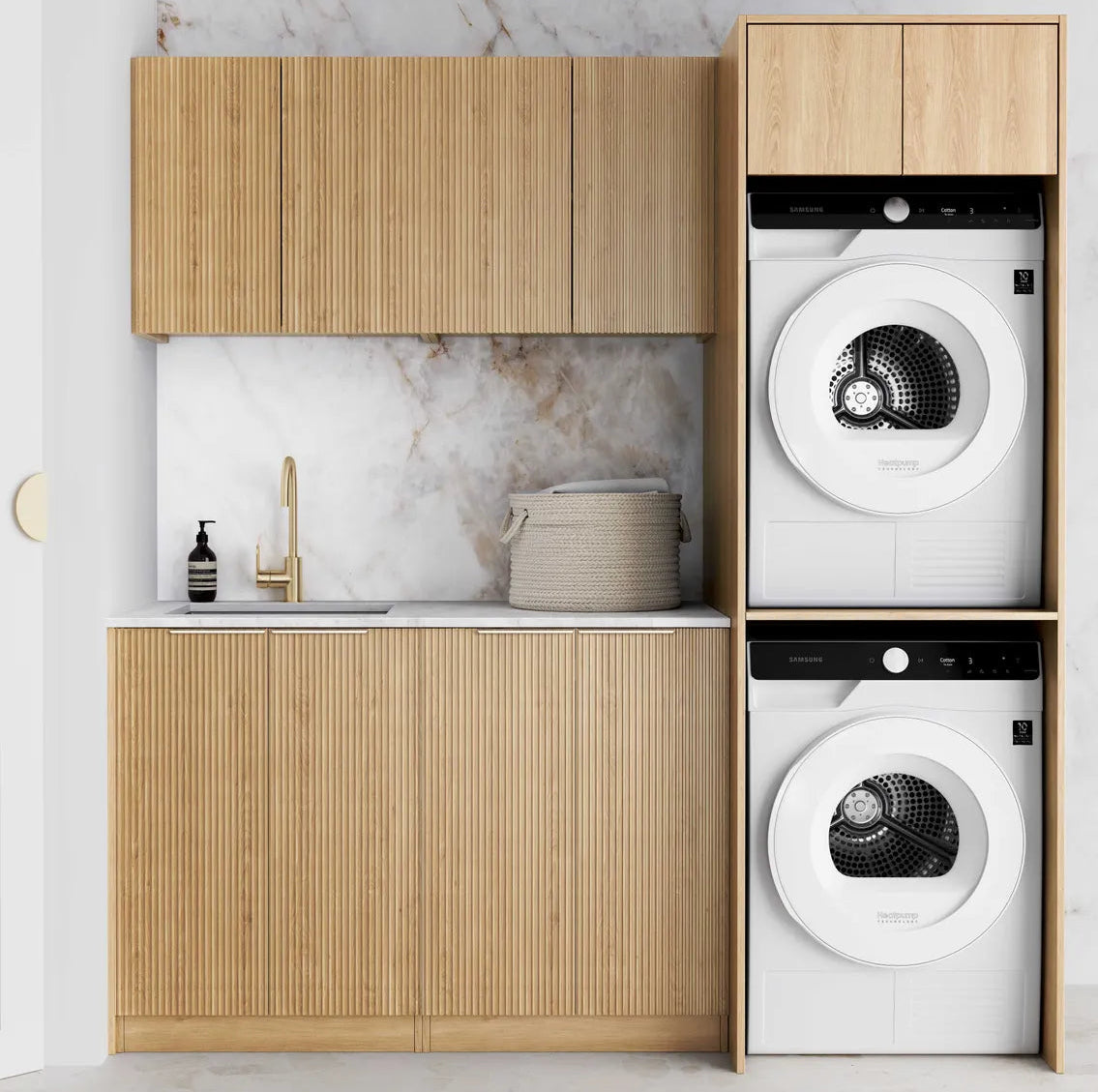 Modern laundry room with wooden cabinets and stacked washer and dryer.
