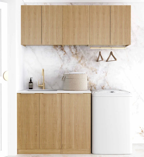 Modern kitchen with wooden cabinets, marble backsplash, and white appliances.
