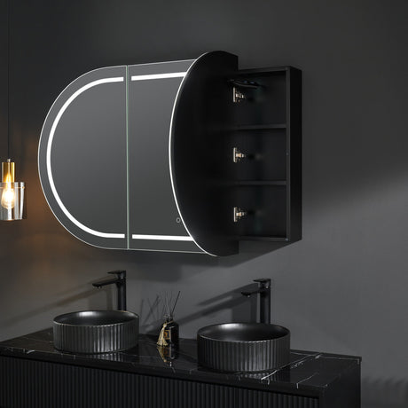 Bathroom setup with a mirror cabinet, sinks, and lighting fixture.