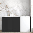 Matte Black finish laundry cabinet with a stone top and a sink, set against a marble wall in a room with wooden flooring.