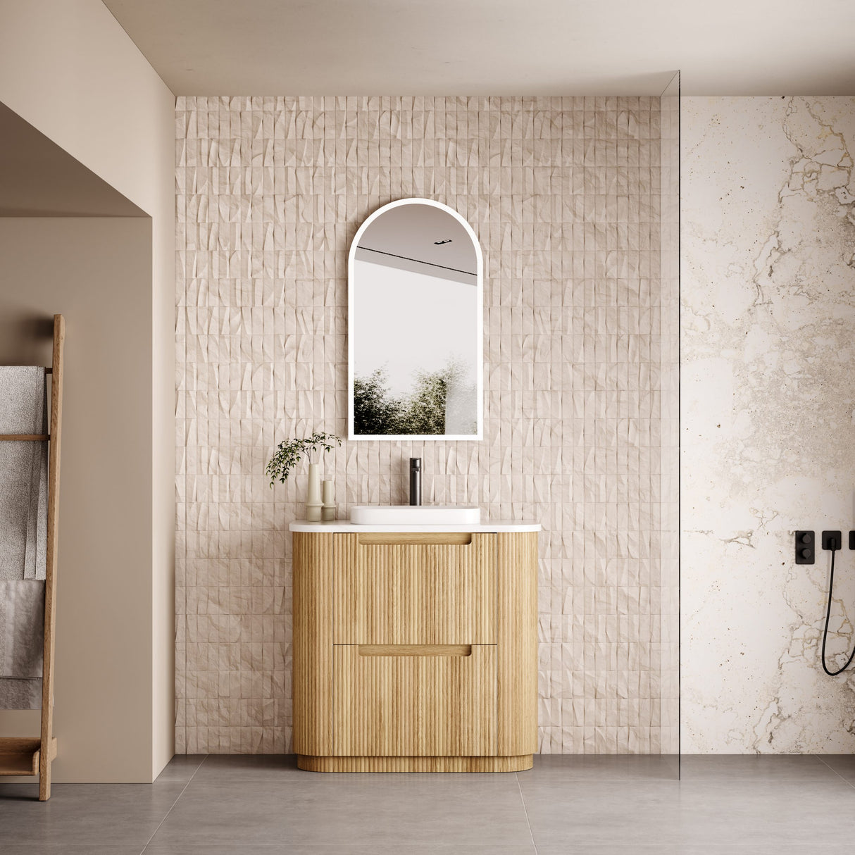 Bathroom with wooden vanity, mirror, and decorative elements.