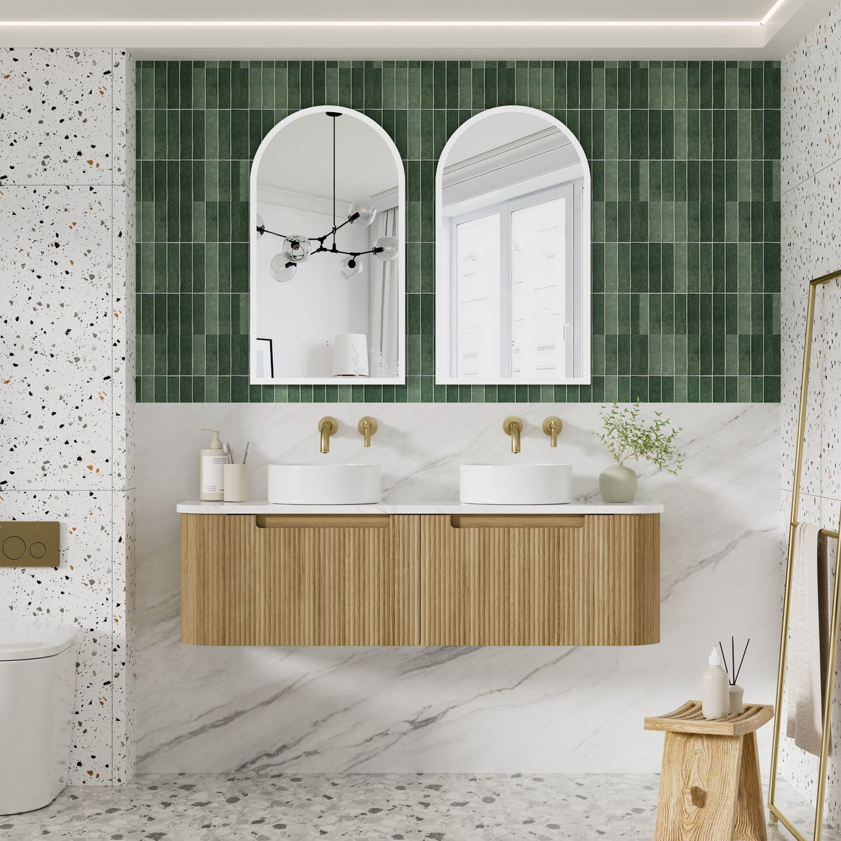 Bathroom with green tiled wall, wooden vanity, and white marble floor.