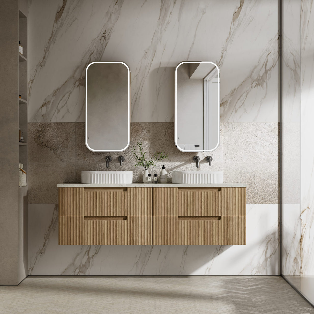 Bathroom vanity with wooden cabinet, two sinks, and mirrors against a marble wall.