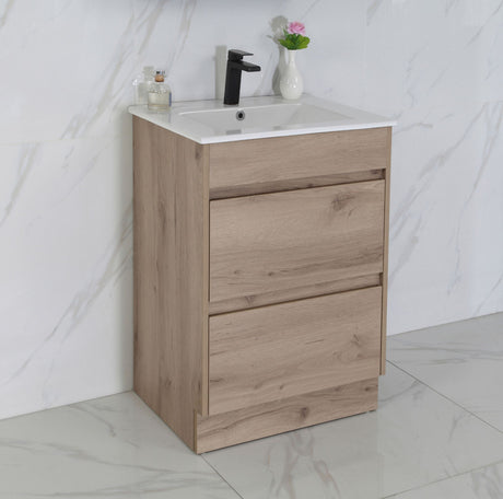 Wooden bathroom vanity with sink against a marble wall
