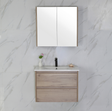 Bathroom vanity with mirror and sink against a marble wall