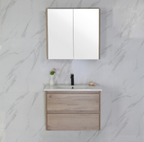 Bathroom vanity with mirror and sink against a marble wall