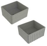 Two gray rectangular farmhouse sinks shown from different angles on a plain white background, one with a smooth interior and one with vertical fluted detailing on the front.